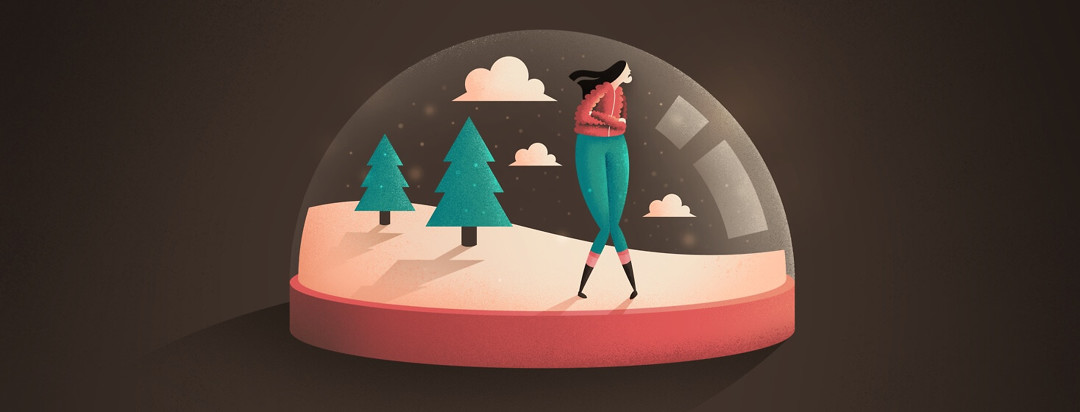 Woman looking sad trapped in a winter snow globe