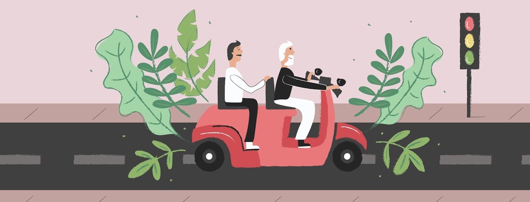two men ridding on an electric scooter with green plants around them