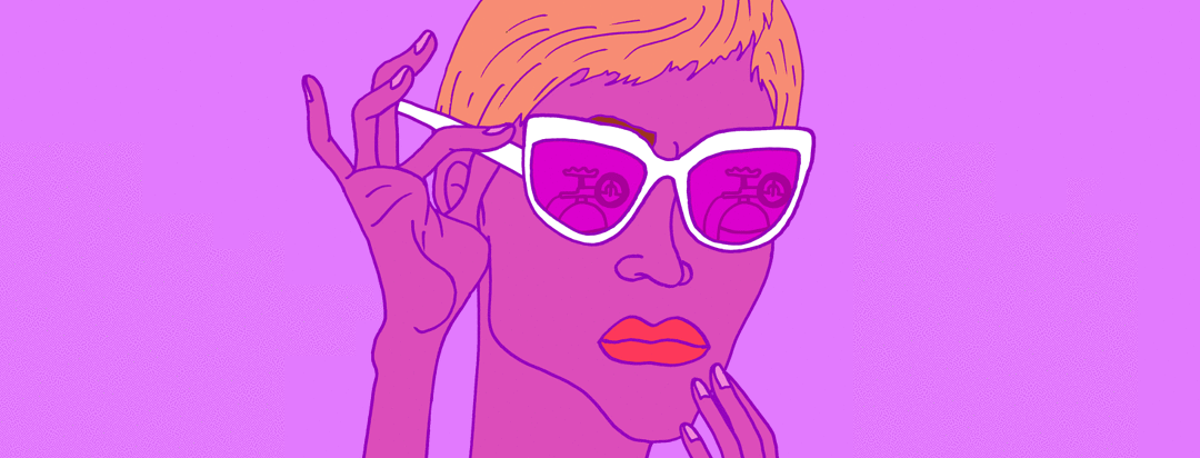 a woman peers over her sunglasses and sneers