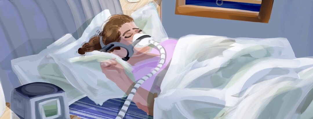a woman asleep in her bedroom bed duvet comforter sheets pillows using a ventilator machine